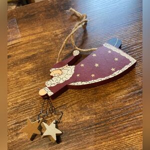 Vintage folk art flying Santa wood ornament